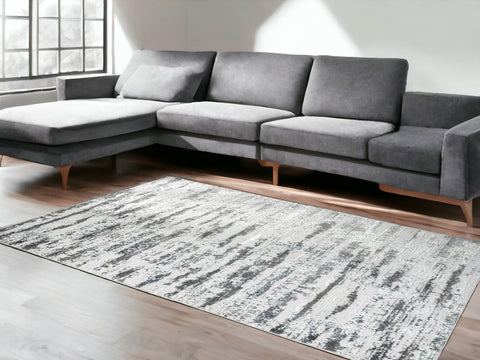 5' X 8' Silver Gray And Off White Abstract Washable Area Rug
