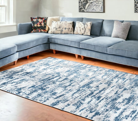 8' X 11' Navy Blue Gray And Off White Abstract Washable Area Rug