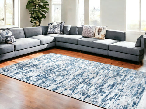 8' X 11' Navy Blue Gray And Off White Abstract Washable Area Rug