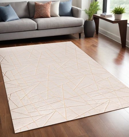 5' X 7' Beige and Gold Faux Fur Abstract Geometric Washable Non Skid Area Rug