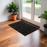 2' X 3' Black and Gold Faux Fur Abstract Shag Non Skid Area Rug