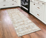 10' Beige Ivory And Off White Abstract Washable Runner Rug