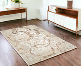 4' X 6' Beige and Gold Abstract Area Rug
