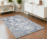 4' X 6' Ivory Blue And Gray Abstract Area Rug
