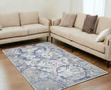 5' X 8' Ivory Blue and Gray Abstract Area Rug