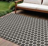 6' X 9' Black And Ivory Geometric Indoor Outdoor Area Rug