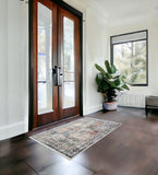 2' X 3' Ivory Blue and Gray Patchwork Distressed Area Rug With Fringe