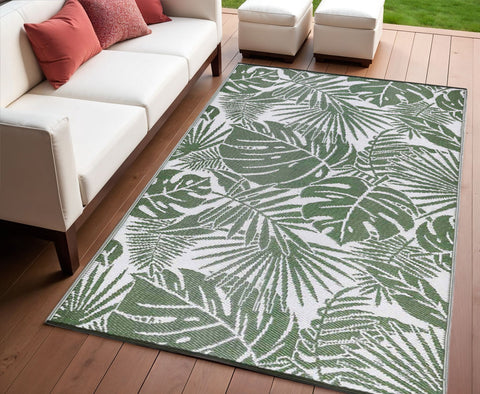 4' X 6' Green Floral Machine Braided Distressed Area Rug With UV Protection