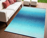 4' X 6' Teal Blue Machine Braided Distressed Area Rug With UV Protection