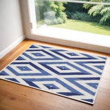 2' X 3' Ivory and Blue Geometric Area Rug