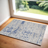 2' X 3' Ivory Blue and Gray Abstract Area Rug