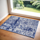 2' X 3' Ivory and Navy Blue Abstract Area Rug