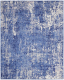 7' X 10' Ivory and Blue Abstract Distressed Area Rug