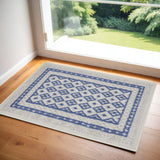 2' X 3' Ivory and Blue Geometric Distressed Area Rug