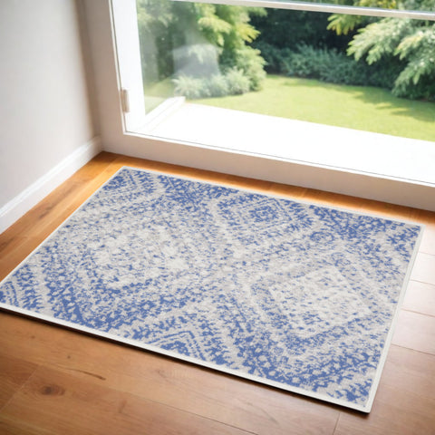 2' X 3' Ivory and Blue Geometric Distressed Area Rug
