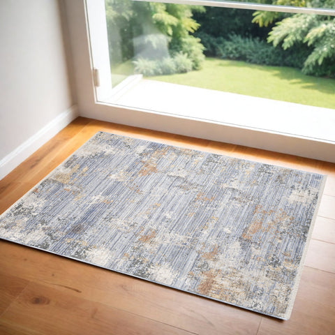 3' X 4' Beige Blue and Gray Abstract Area Rug With Fringe