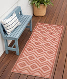 6' Coral And Orange Geometric Indoor Outdoor Area Rug