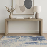 4' X 6' Cream Blue And Light Blue Abstract Area Rug