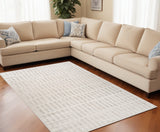5' X 8' Gray and Beige Geometric Distressed Area Rug