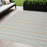 5' X 7' Cream and Beige Striped Distressed Indoor Outdoor Area Rug