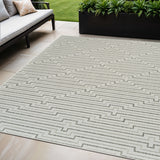 5' X 7' Cream and Beige Geometric Distressed Indoor Outdoor Area Rug