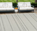 6' X 9' Cream and Beige Striped Distressed Indoor Outdoor Area Rug