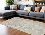 7' X 10' Cream and Beige Abstract Distressed Area Rug