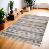 4' X 6' Beige and Gray Abstract Distressed Area Rug