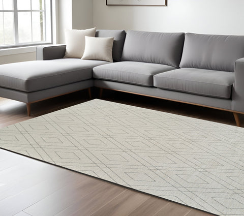 7' X 10' Beige and Gray Abstract Non Skid Area Rug