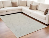 5' X 8' Cream and Beige Abstract Non Skid Area Rug