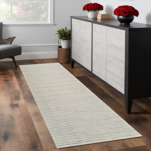 8' Cream and Beige Abstract Non Skid Runner Rug