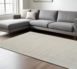 7' X 10' Cream and Beige Abstract Non Skid Area Rug