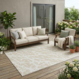 5' X 8' Beige and Ivory Abstract Washable Non Skid Indoor Outdoor Area Rug