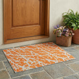3' X 5' Orange and White Abstract Washable Non Skid Indoor Outdoor Area Rug