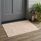 3' X 5' Peach and Ivory Abstract Washable Non Skid Indoor Outdoor Area Rug