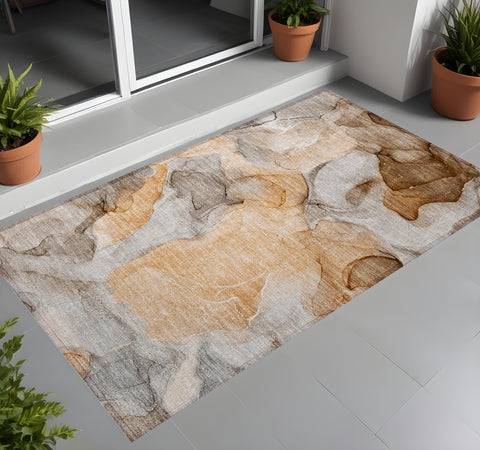 2' X 3' Orange Abstract Washable Non Skid Indoor Outdoor Area Rug