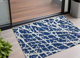 2' X 3' Navy and Ivory Abstract Washable Non Skid Indoor Outdoor Area Rug