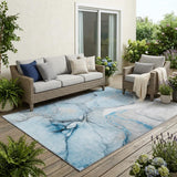 5' X 8' Blue and Ivory Abstract Washable Non Skid Indoor Outdoor Area Rug