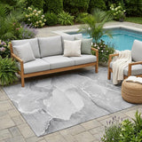 5' X 8' Gray and Ivory Abstract Washable Non Skid Indoor Outdoor Area Rug