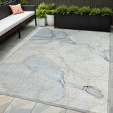 5' X 8' Beige and Blue Abstract Washable Non Skid Indoor Outdoor Area Rug