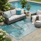 5' X 8' Teal Abstract Washable Non Skid Indoor Outdoor Area Rug