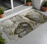 2' X 3' Gray and Gold Abstract Washable Non Skid Indoor Outdoor Area Rug
