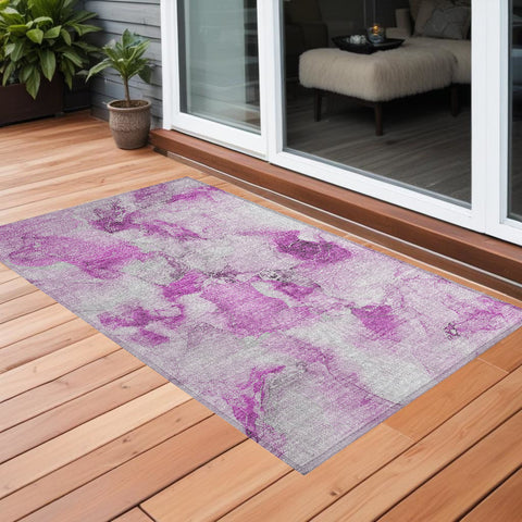 3' X 5' Pink and Ivory Abstract Washable Non Skid Indoor Outdoor Area Rug