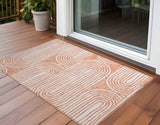 2' X 3' Orange and Ivory Abstract Washable Non Skid Indoor Outdoor Area Rug