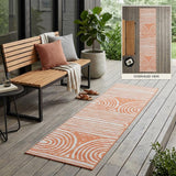 2' X 8' Orange and Ivory Abstract Washable Non Skid Indoor Outdoor Area Rug