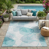 5' X 8' Teal and Ivory Abstract Washable Non Skid Indoor Outdoor Area Rug