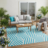5' X 8' Teal and White Geometric Washable Non Skid Indoor Outdoor Area Rug
