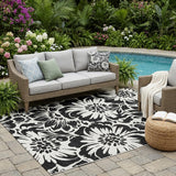 5' X 8' Black and Ivory Floral Washable Non Skid Indoor Outdoor Area Rug