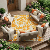 8' X 10' Orange and White Floral Washable Non Skid Indoor Outdoor Area Rug