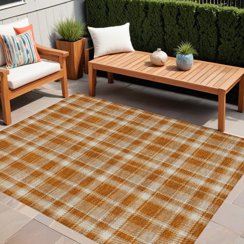 5' X 8' Orange and Ivory Plaid Washable Non Skid Indoor Outdoor Area Rug
